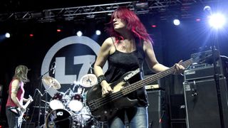 Donita Sparks, Demetra Plakas, and Jennifer Finch of L7 performing in 2015