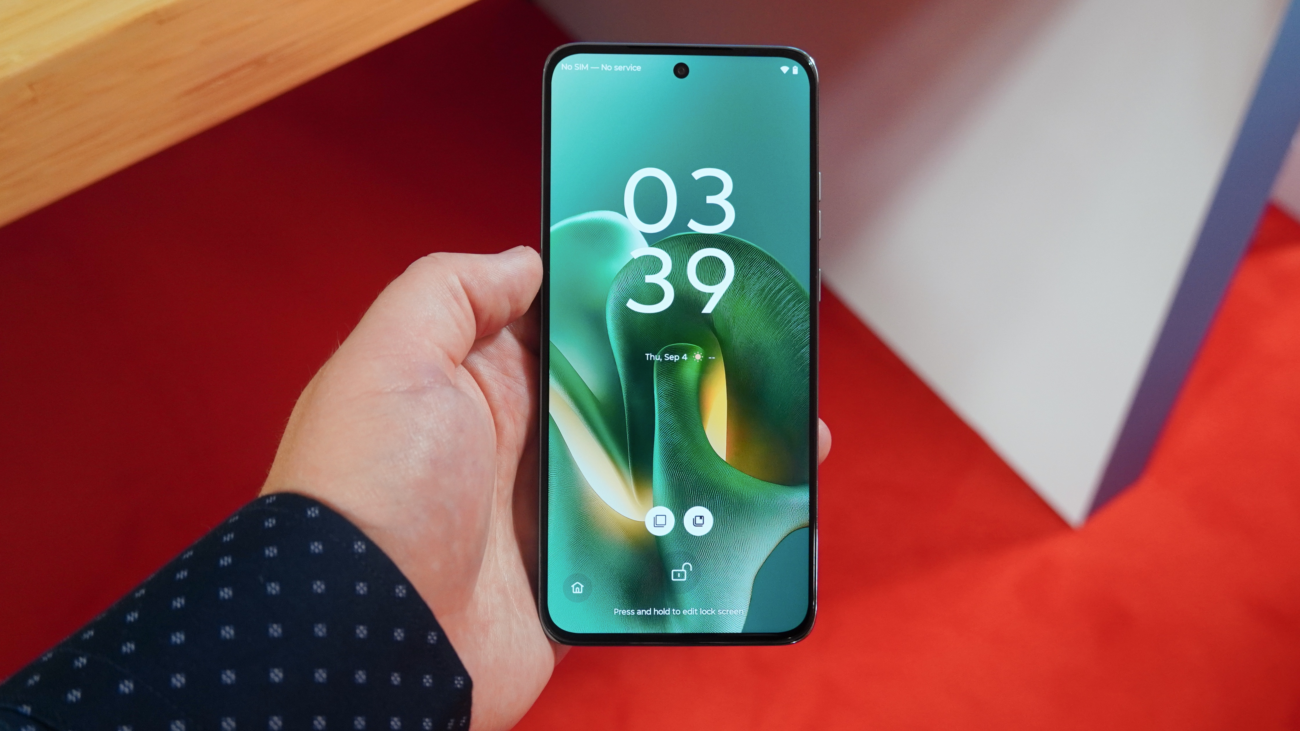 The Motorola Edge 60 Neo in the hand and on display at IFA 2025.