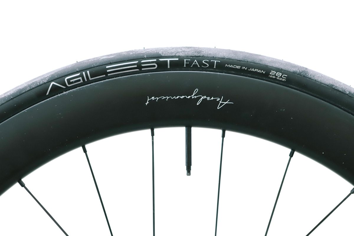 a close up of a black road bike tyre