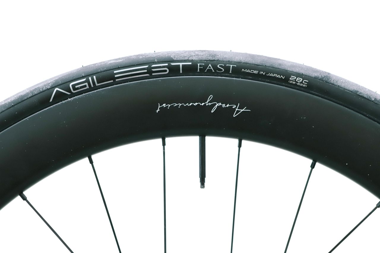 a close up of a black road bike tyre