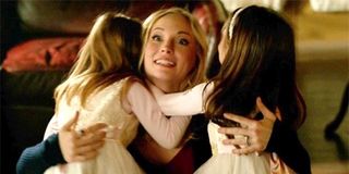 Candice King as Caroline Forbes with young Lizzie and Josie Saltzman on The Vampire Diaries