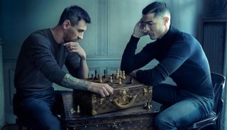 Image of chess match between Ronaldo and Messi