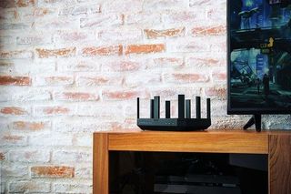 A router resting on a small desk