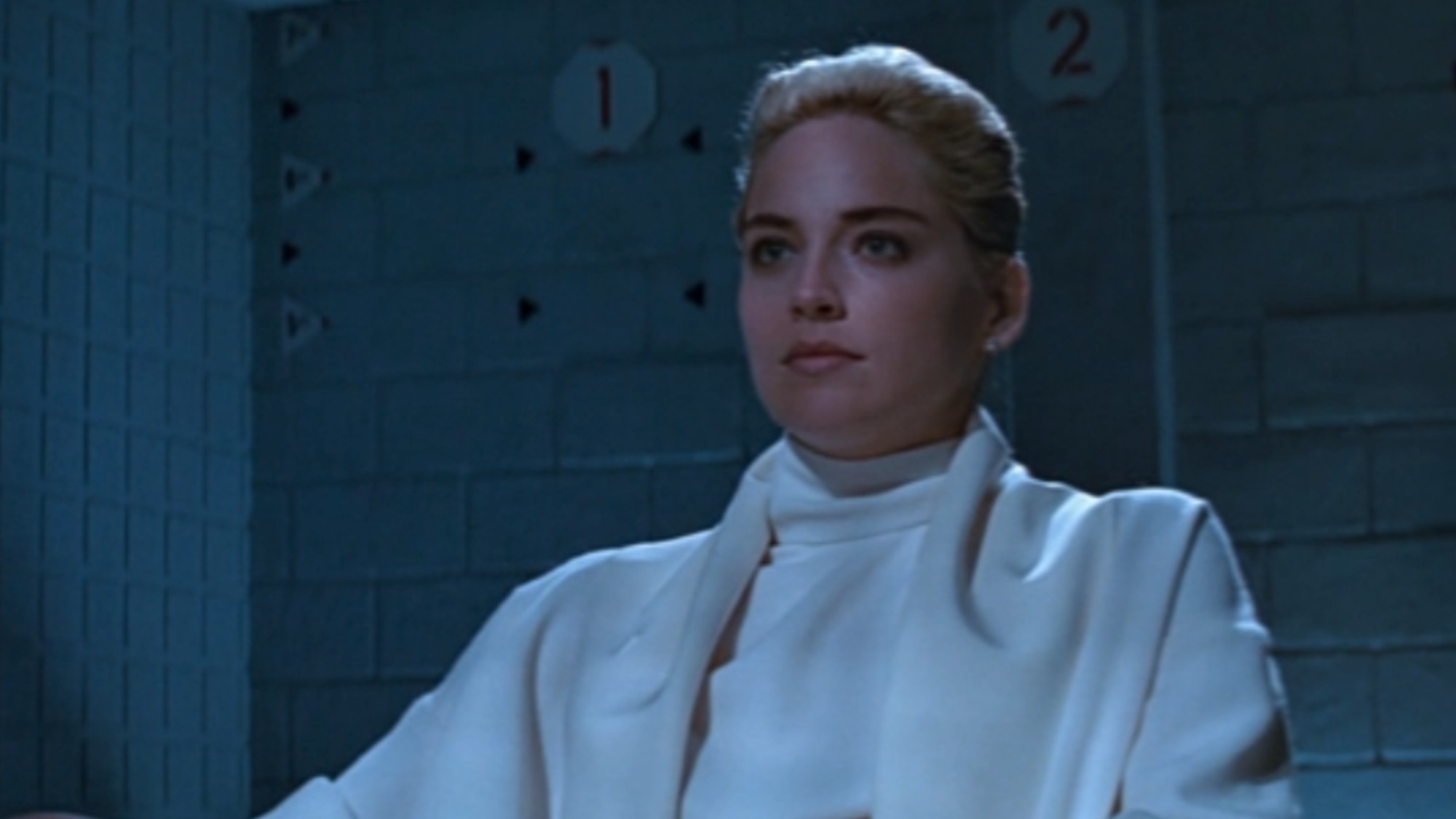 Sharon Stone in all white in the famous interrogation scene in Basic Instinct. 