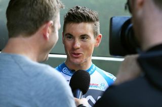 Ben Swift talks with reporters after stage 5 at the Tour of Britain.