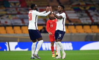 England’s Ryan Sessegnon (right) celebrates after Turkey’s Huseyin Turkmen scores an own goal