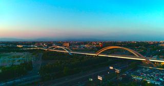 Aerial view of bridge at sunset