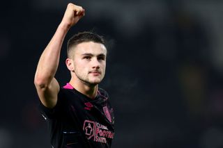 Taylor Harwood-Bellis of Burnley celebrates following his team's victory in the Sky Bet Championship between Swansea City and Burnley at Liberty Stadium on January 02, 2023 in Swansea, Wales.
