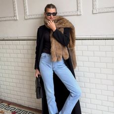 Sara Walker in a Jil Sander coat and Levi's jeans