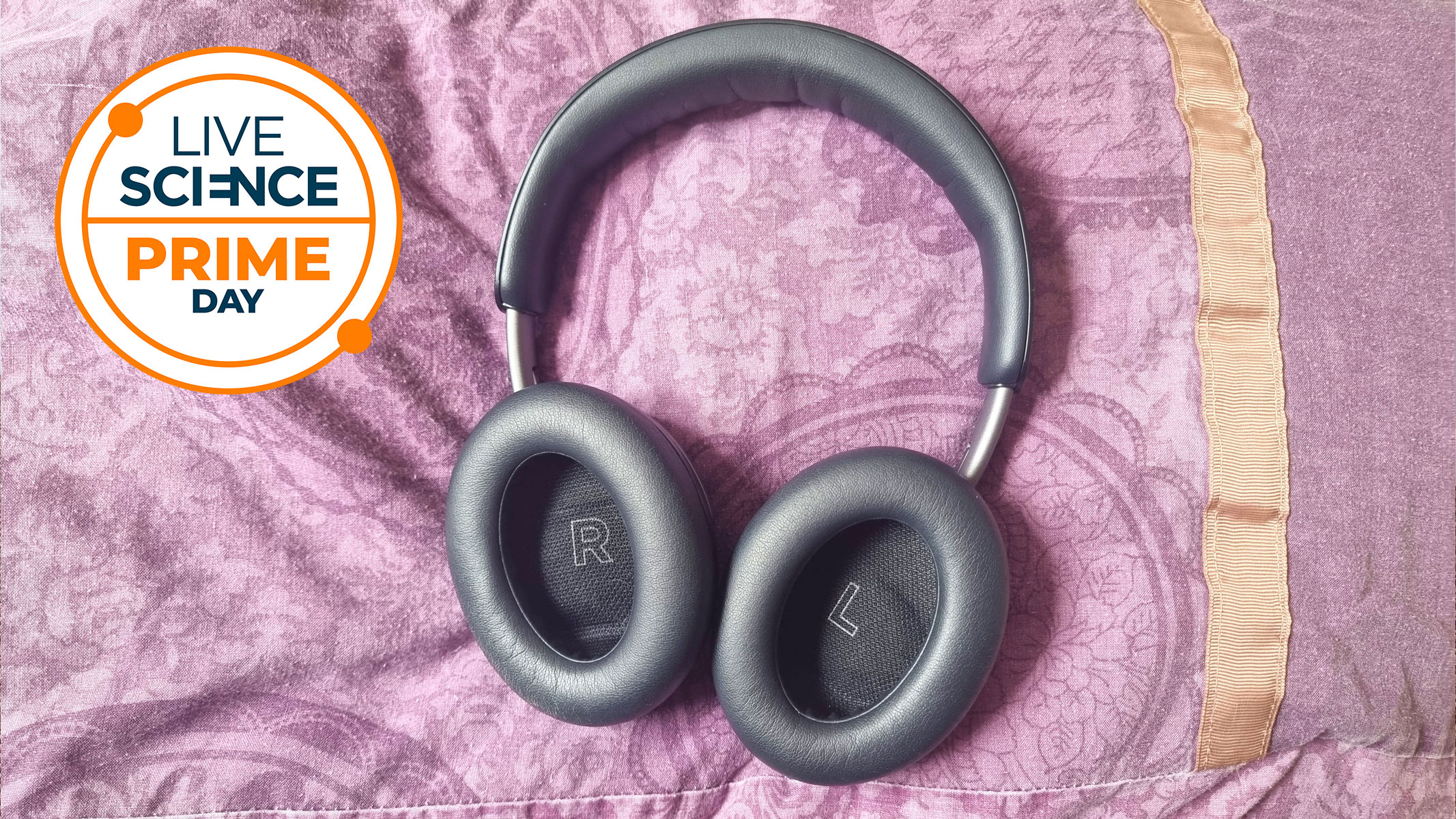 A Live Science Prime Day deal logo and our reviewer's Bose QuietComfort headphones on a purple background