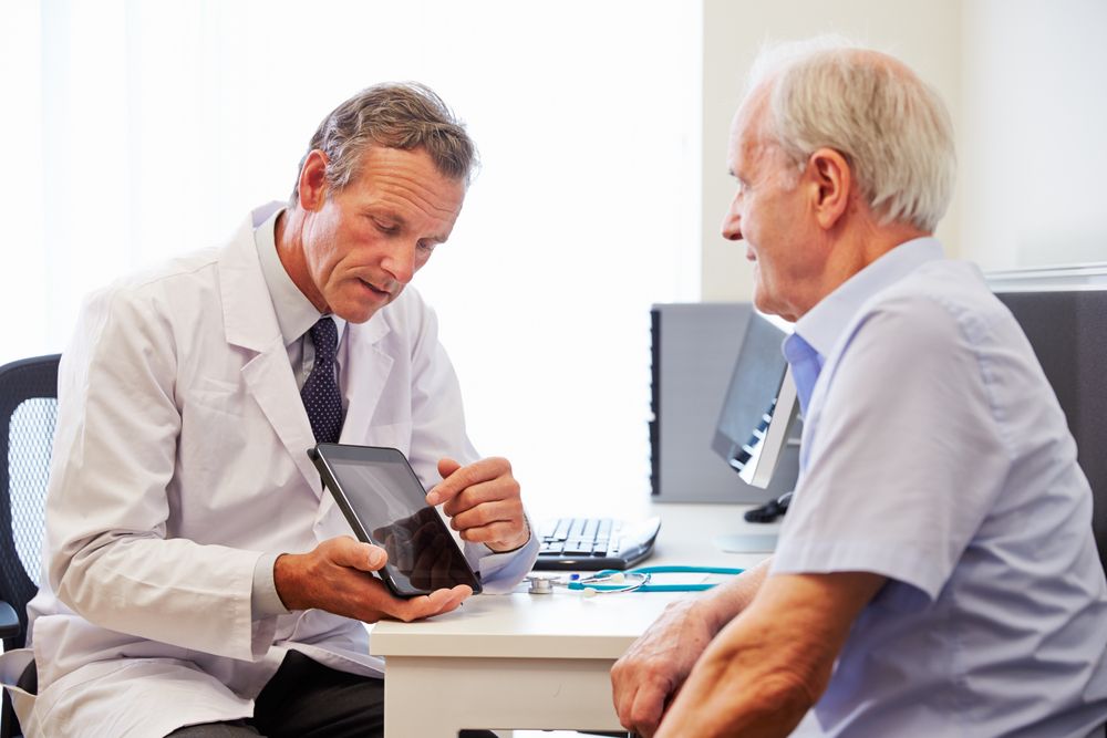 A GP with an elderly patient 