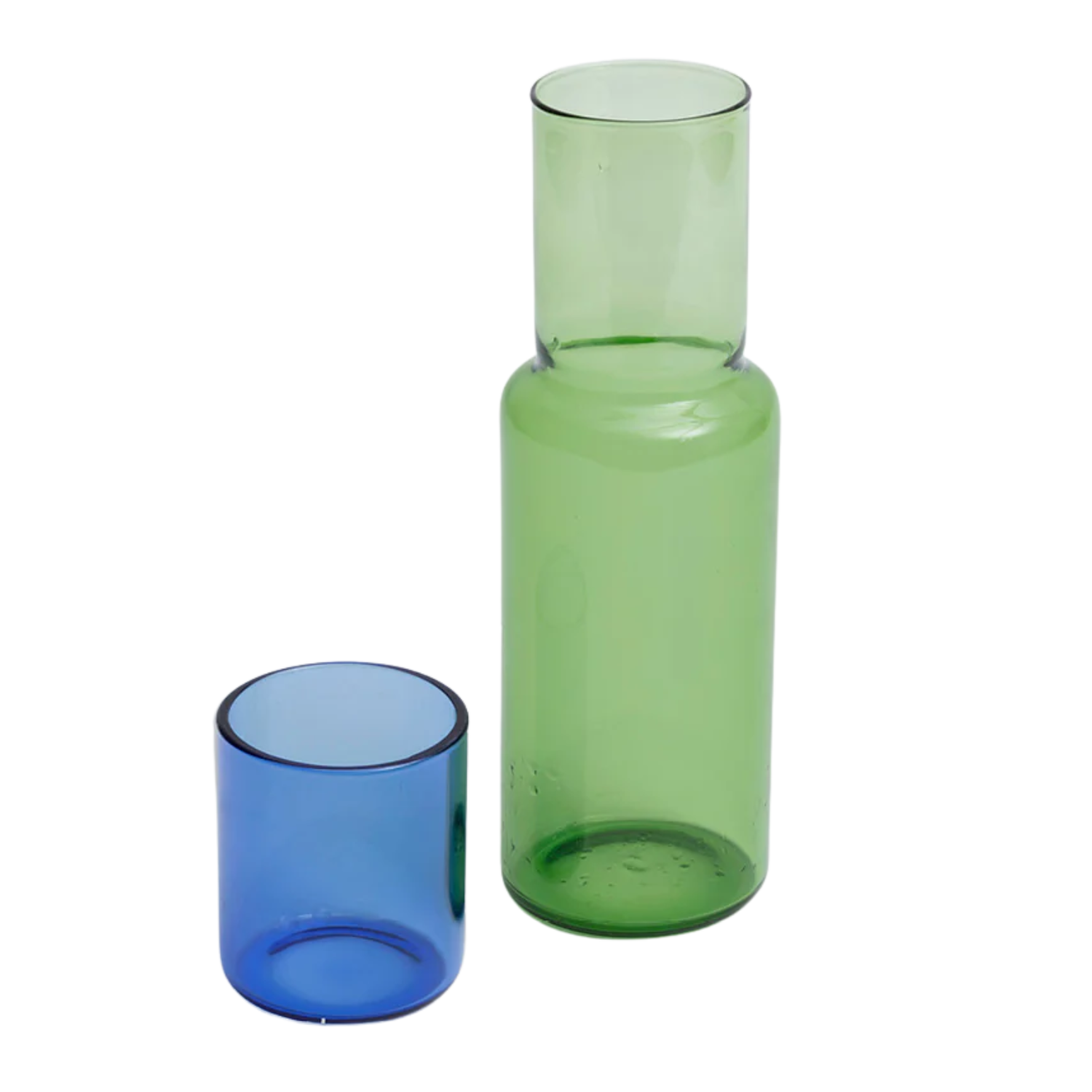 A green glass carafe with a blue glass