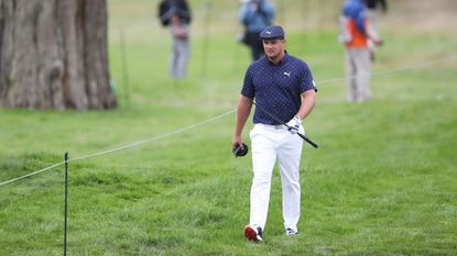 Bryson DeChambeau with a snapped driver