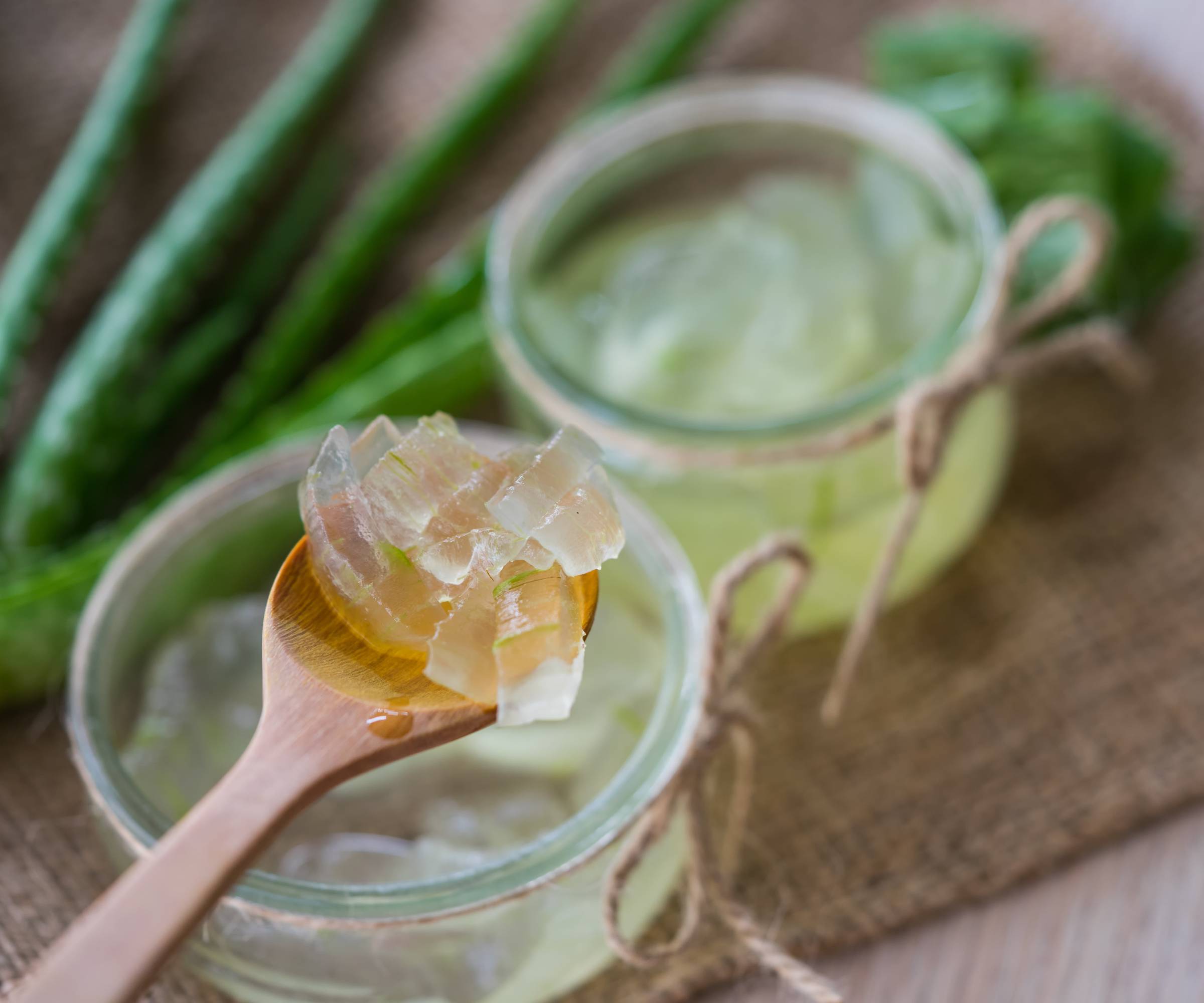 Aloe gel on a wooden spoon