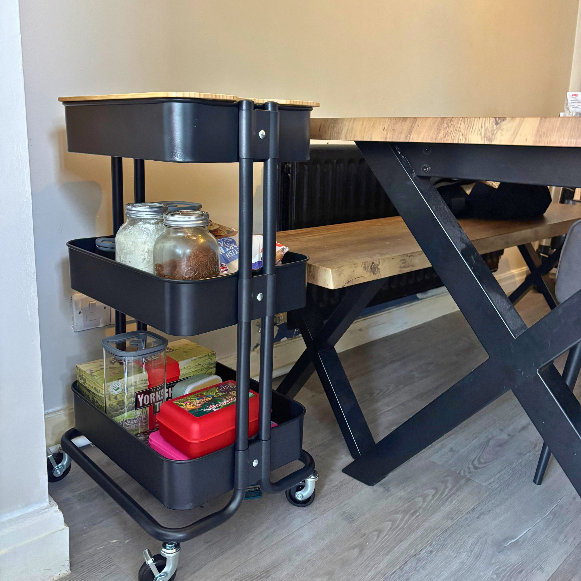 Kitchen trolley next to dining table
