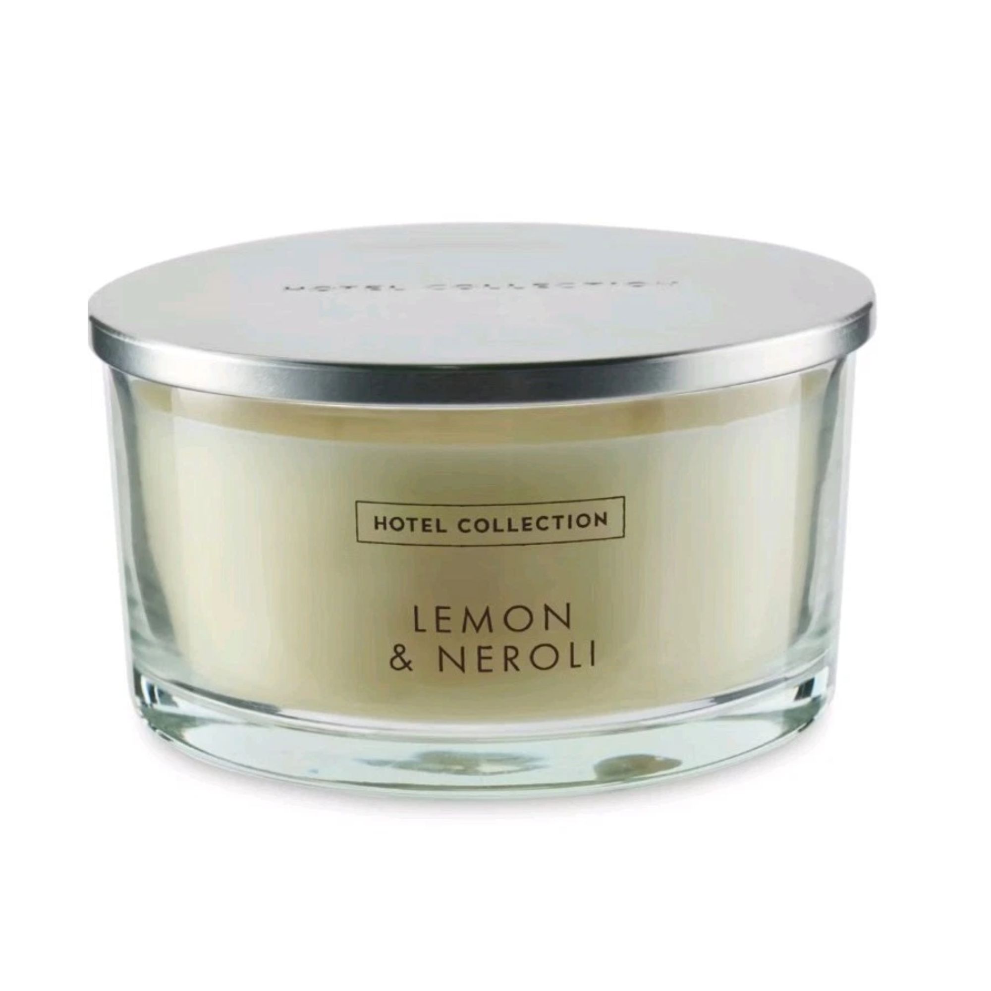 Aldi Lemon and Neroli Hotel Collection candle on a white background