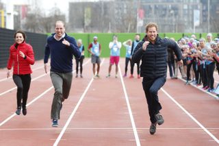 Kate Middleton, Prince William and Prince Harry racing each other on running track