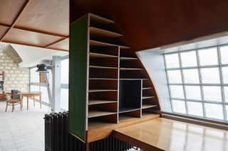 The private studio of le Corbusier with study area with inbuilt storage designed by Le Corbusier