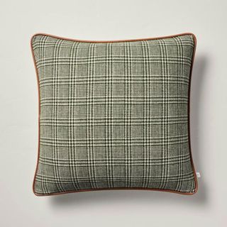 A green checkered throw pillow