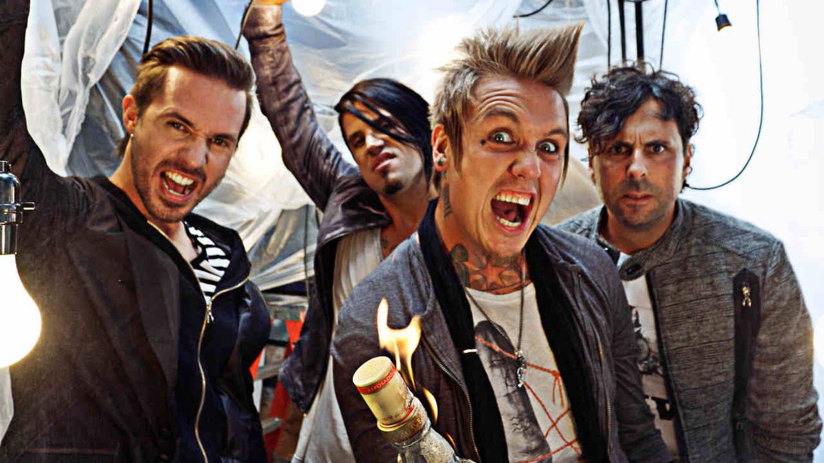 Papa Roach with Jacoby Shaddix holding a Molotov cocktail