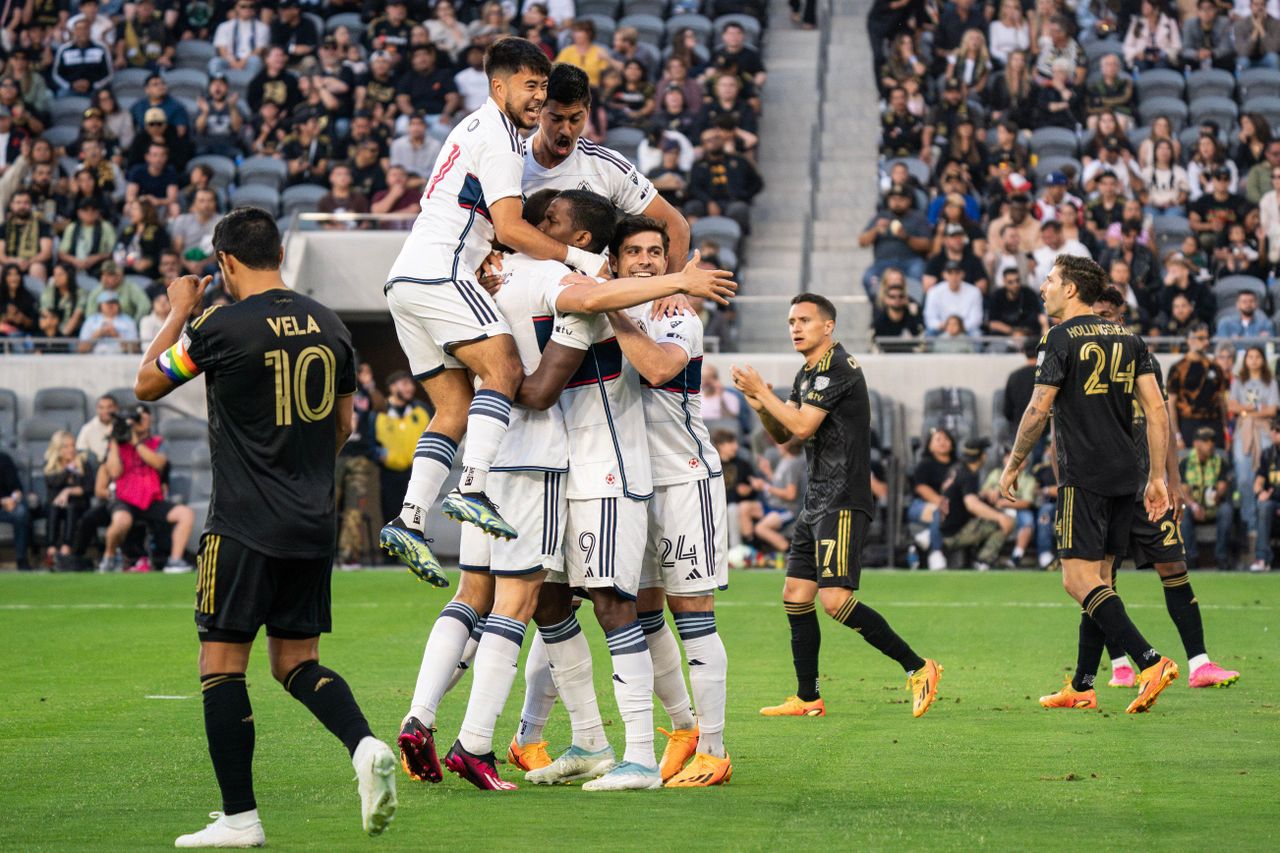 Vancouver Whitecaps players celebrate a goal against LAFC, June 2023