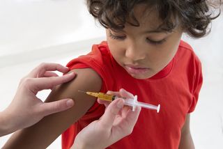 A child receives a vaccination.