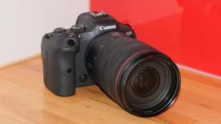 The Canon EOS R6 full-frame mirrorless camera. This shot shows it from the front, with the 27-70mm lens attached