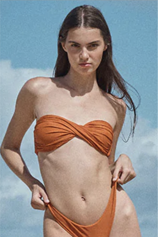 woman wearing orange bikini