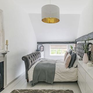 master bedroom with grey bed
