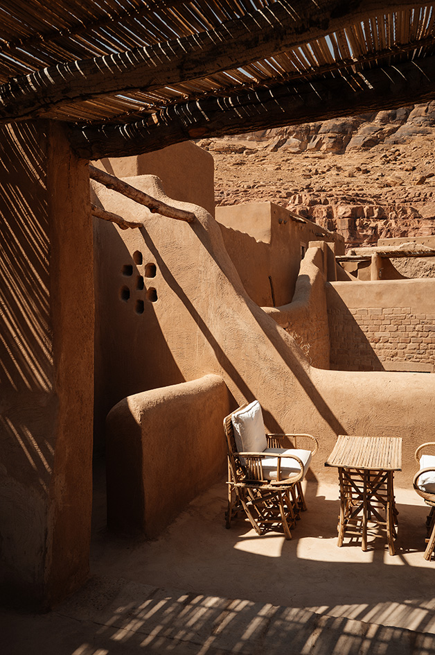 views of mud brick house with warm hues in desert building style, Bin Nouh's Courtyard House by Shahira Fahmy