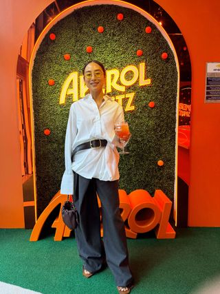 Greta Lee attends the 2024 US Open with Aperol