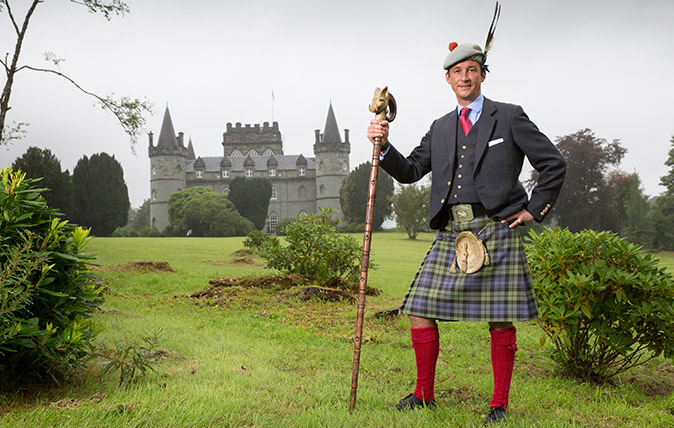 Torquil Campbell the Duke of Argyll of the Campbell Clan in the grounds of Inveraray Castle. The stick has a wild boar&#039;s head carved into it; this is the emblem of the Clan Campbell. Picture Robert Perry for Country Life 14th August 2018