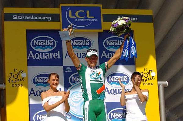 Thor Hushovd (CA) salutes from the podium