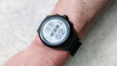Coros Apex 2 Pro smartwatch on a male cyclist's wrist