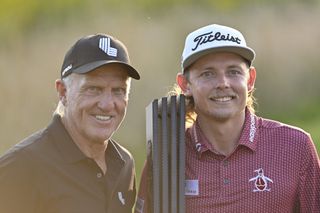 Cameron Smith and Greg Norman celebrating Smith's first win with LIV Golf