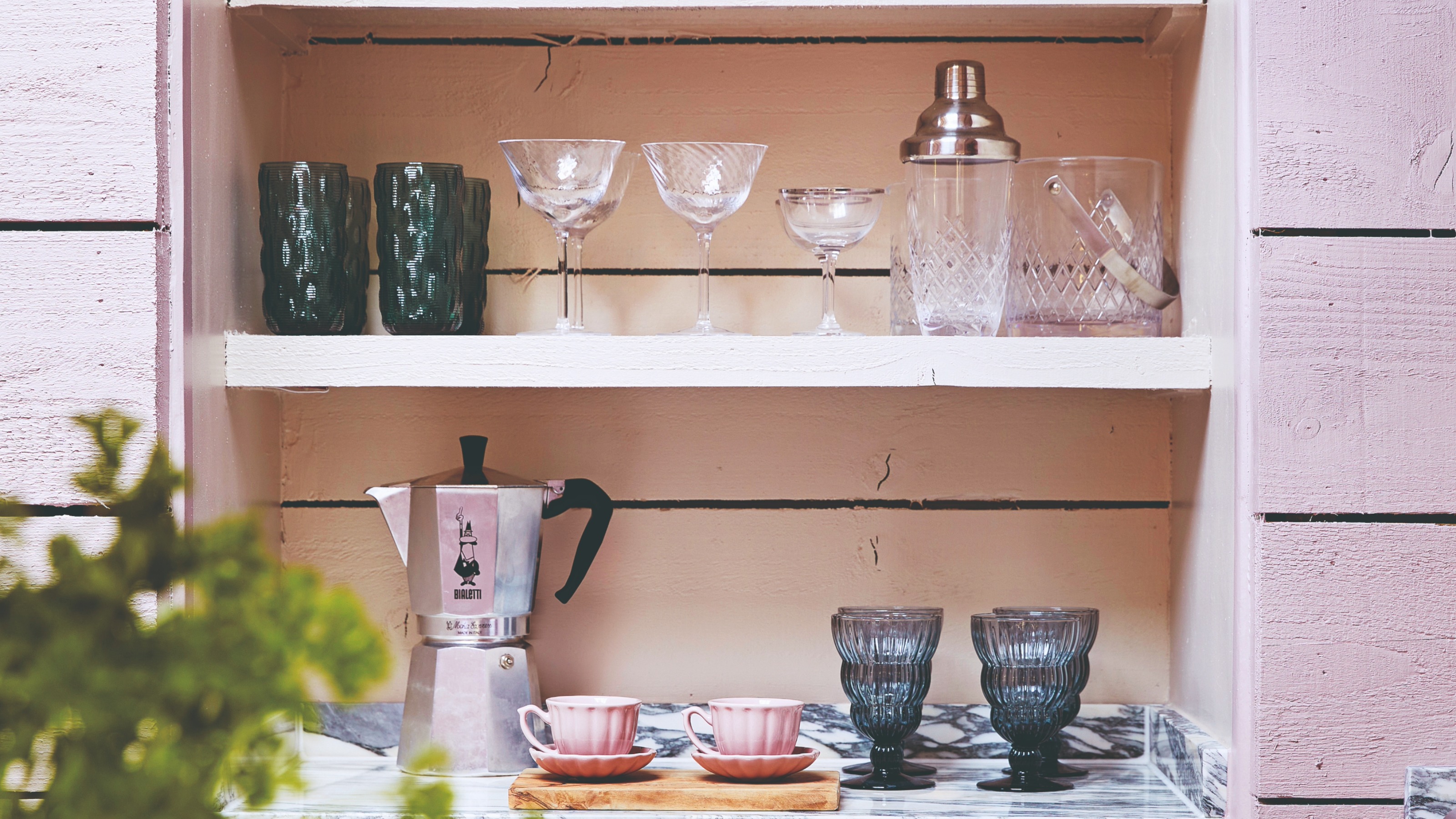 Mugs and a cafetiere in a coffee station 