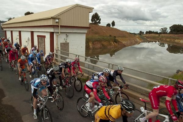 The peloton pass over a bridge near Colbinabbin during the 155km first stage of the tour from Echuca to Rochester.