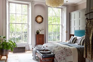 Bedroom in period house with wooden shutters
