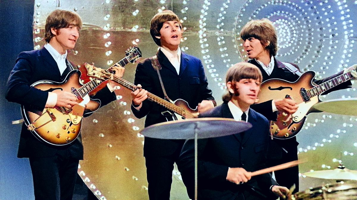 The Beatles perform &#039;Rain&#039; and &#039;Paperback Writer&#039; on BBC TV show &#039;Top Of The Pops&#039; in London on 16th June 1966. Left to right: John Lennon (1940-1980), Paul McCartney, Ringo Starr and George Harrison (1943-2001). 