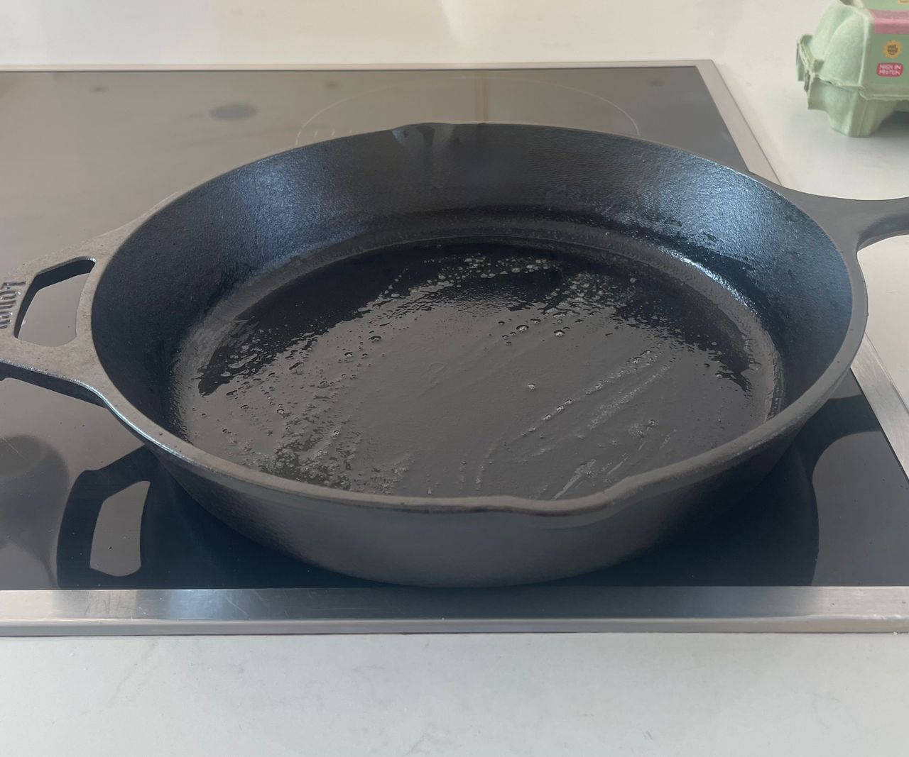 Browning meatballs in the Lodge Chef Collection Skillet