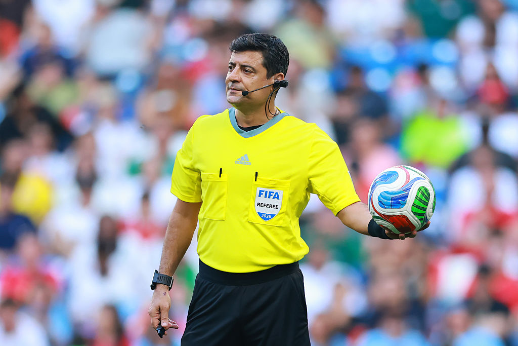 GUADALUPE, MEXICO - MARCH 26: Referee Alireza Faghani gestures during the FIFA World Cup 2026 Qualifying Playoff tournament match between Bolivia and Suriname at Estadio Monterrey on March 26, 2026 in Guadalupe, Mexico. (Photo by Hector Vivas - FIFA/FIFA via Getty Images)