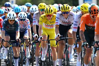 NIMES FRANCE JULY 16 EDITORS NOTE Alternate crop LR Tadej Pogacar of Slovenia Yellow Leader Jersey and Nils Politt of Germany and UAE Team Emirates compete during the 111th Tour de France 2024 Stage 16 a 1886km stage from Gruissan to Nimes UCIWT on July 16 2024 in Nimes France Photo by Dario BelingheriGetty Images