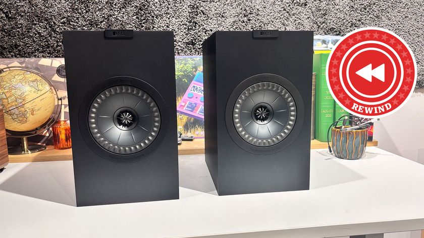 KEF Q3 Meta on table with Rewind logo