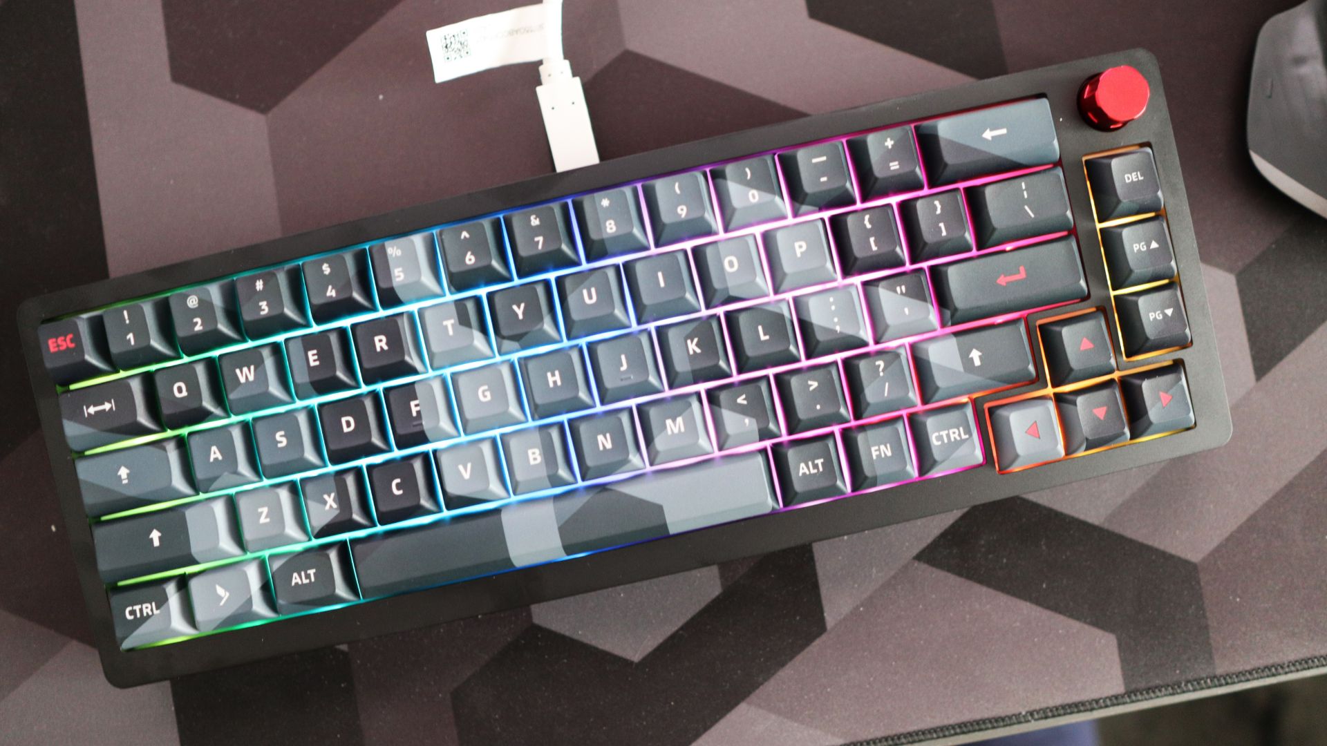 A Das Keyboard DeltaForce 65 gaming keyboard with Cherry MX switches and in camo colourway on a desk.