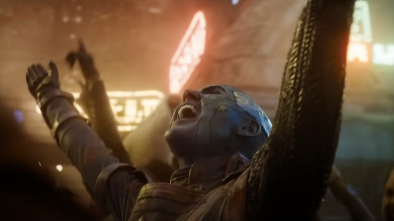 Karen Gillan raises her arms in joy in a Knowhere crowd in Guardians of the Galaxy Vol.  3.