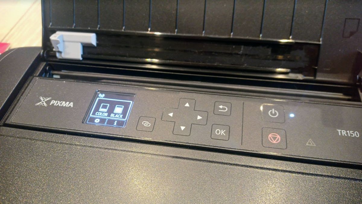 Canon PIXMA TR150 Wireless Inkjet Printer being tested in writer's home