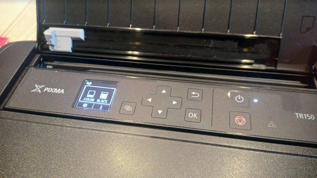 Canon PIXMA TR150 Wireless Inkjet Printer being tested in writer's home