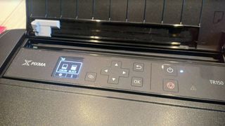 Canon PIXMA TR150 Wireless Inkjet Printer being tested in writer's home