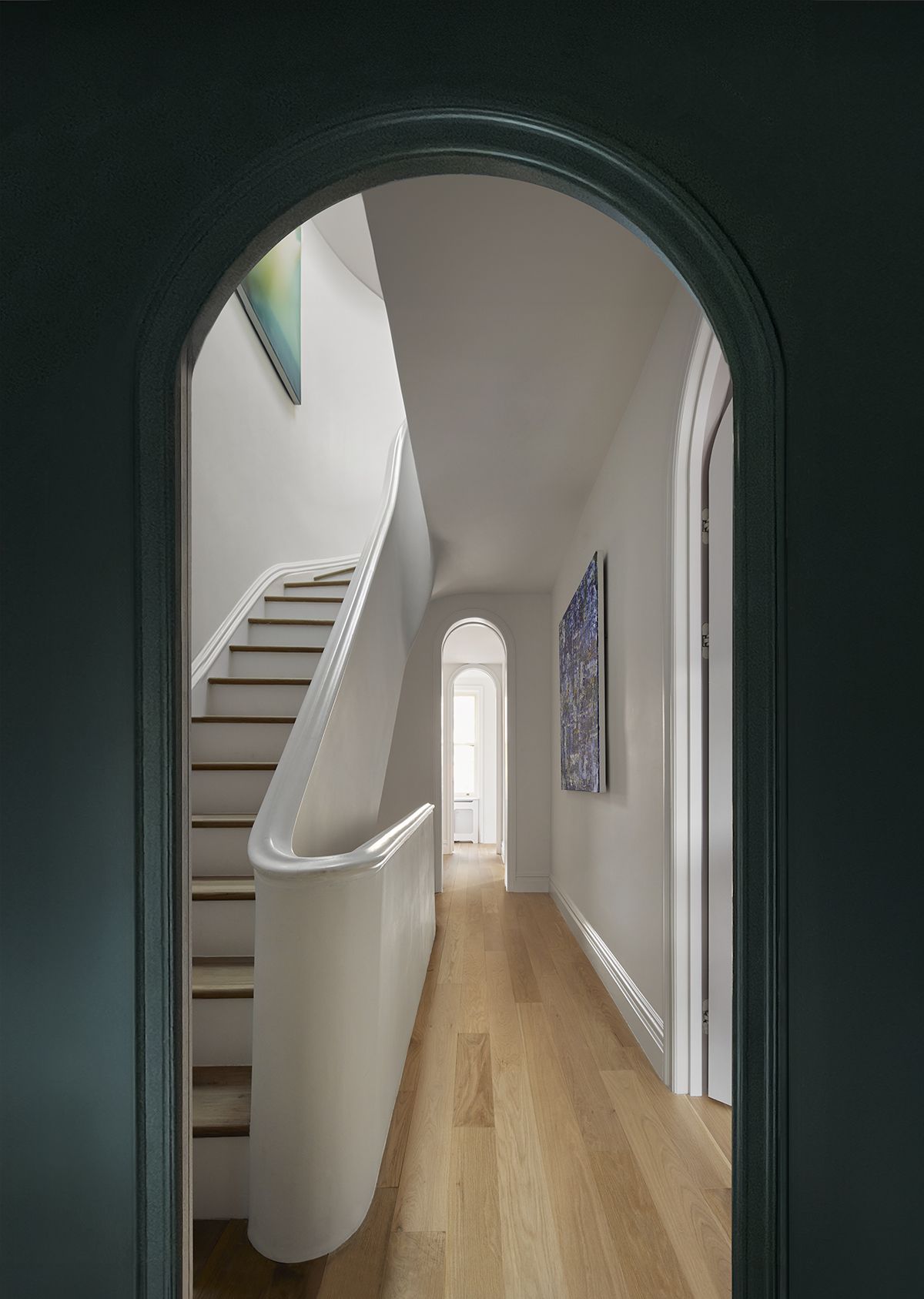 New York townhouse blue corridor and stairs in the distance