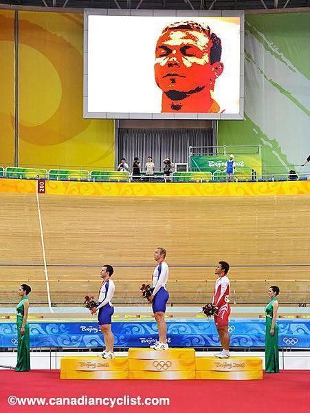 Give us a hoy: Chris Hoy (Great Britain) stands proudly at the centre of the podium
